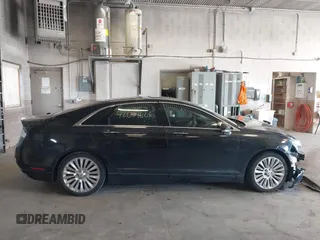 2013 Lincoln MKZ z VIN 3LN6L2G94DR823887, wystawiony jako IAAI lot #42054666 z przebiegiem 101 866 mil mil oraz . Historia ofert i sprzedaży dostępna na DreamBid. Obrazek 14.