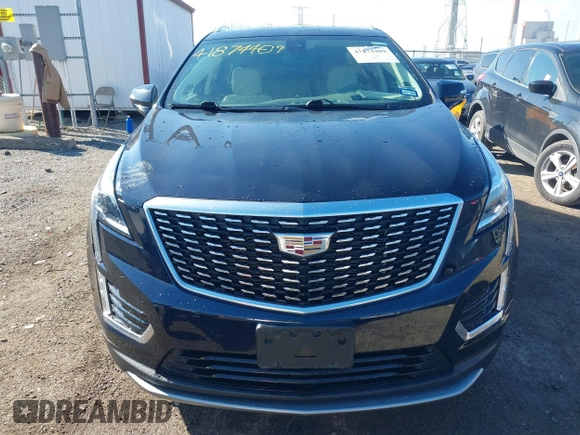 2021 Cadillac XT5 FWD Premium Luxury z VIN 1GYKNCRS2MZ141440, wystawiony jako IAAI lot #41874409 z przebiegiem 76 911 mil mil oraz . Historia ofert i sprzedaży dostępna na DreamBid. Obrazek 12.
