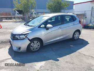 2015 Honda Fit LX z VIN 3HGGK5H51FM750102, wystawiony jako IAAI lot #42278830 z przebiegiem 121 855 mil mil oraz . Historia ofert i sprzedaży dostępna na DreamBid. Obrazek 17.
