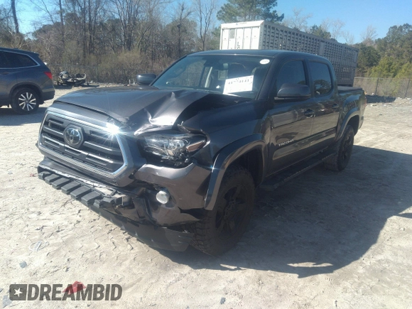 2018 Toyota Tacoma SR5 with VIN 5TFAZ5CN0JX056706, listed as a IAAI auction lot 41774141 with 31,738 mi miles and . Bid and sale history available at DreamBid. Image 17.