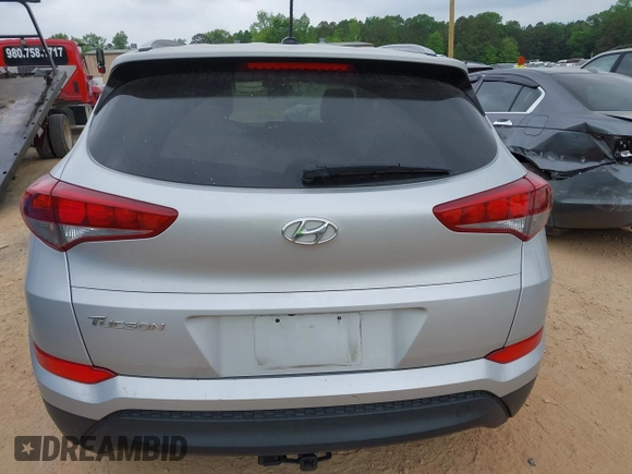 2016 Hyundai Tucson SE z VIN KM8J33A48GU116852, wystawiony jako IAAI lot #42111656 z przebiegiem 138 656 mil mil oraz . Historia ofert i sprzedaży dostępna na DreamBid. Obrazek 16.