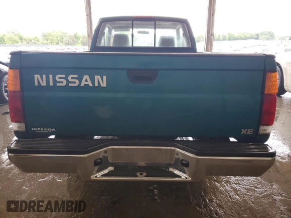 1997 Nissan Frontier XE with VIN 1N6SD16SXVC346717, listed as a Copart auction lot 55442215 with 112,343 mi miles and Salvage title. Bid and sale history available at DreamBid. Image 6.