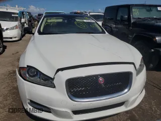 2014 Jaguar XJ Portfolio z VIN SAJWA2GZ0E8V59422, wystawiony jako Copart lot #74213414 z przebiegiem 96 314 mil mil oraz Nie do naprawy • Non repairable. Historia ofert i sprzedaży dostępna na DreamBid. Obrazek 5.