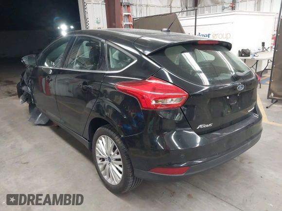 2017 Ford Focus Titanium with VIN 1FADP3N24HL272396, listed as a IAAI auction lot 41852208 with 92,945 mi miles and . Bid and sale history available at carsss.com. Image 3.