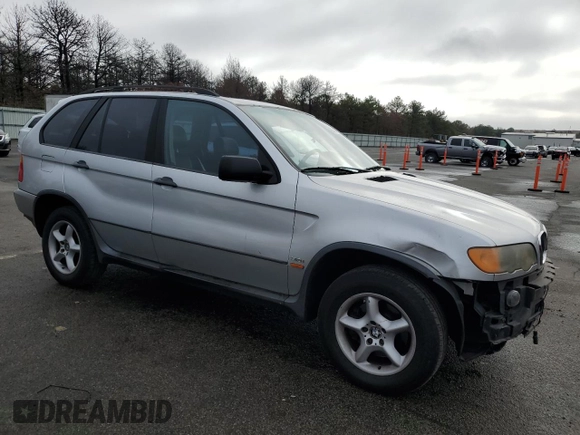 2001 BMW X5 3.0i with VIN WBAFA53561LM65536, listed as a Copart auction lot 84695444 with 122,849 mi miles and Salvage Title. Bid and sale history available at carsss.com. Image 4.
