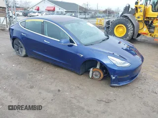 2018 Tesla Model 3 Long Range Battery with VIN 5YJ3E1EB4JF094496, listed as a IAAI auction lot 41983799 with 188,316 mi miles and . Bid and sale history available at DreamBid. Image 1.