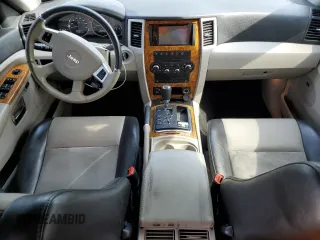2010 Jeep Grand Cherokee Limited with VIN 1J4RR5GT2AC150518, listed as a Copart auction lot 54101275 with 135,851 mi miles and Salvage title. Bid and sale history available at DreamBid. Image 8.
