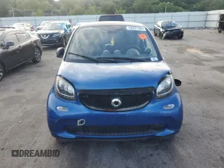 2016 Smart fortwo Passion z VIN WMEFJ5DA0GK076339, wystawiony jako Copart lot #68891564 z przebiegiem Nie podano mil oraz Szkoda całkowita • Salvage title. Historia ofert i sprzedaży dostępna na DreamBid. Obrazek 5.