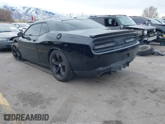 2015 Dodge Challenger R/T with VIN 2C3CDZATXFH712765, listed as a IAAI auction lot 41817210 with 99,535 mi miles and . Bid and sale history available at DreamBid. Image 3.
