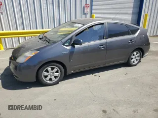 2007 Toyota Prius z VIN JTDKB20U373216659, wystawiony jako Copart lot #60930375 z przebiegiem 155 283 mil mil oraz Czysty tytuł • Clean title. Historia ofert i sprzedaży dostępna na DreamBid. Obrazek 1.