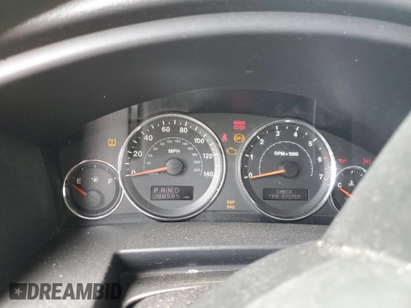 2009 Jeep Commander Sport z VIN 1J8HG48K29C531877, wystawiony jako Copart lot #58708825 z przebiegiem 198 585 mil mil oraz Szkoda całkowita • Salvage title. Historia ofert i sprzedaży dostępna na DreamBid. Obrazek 9.