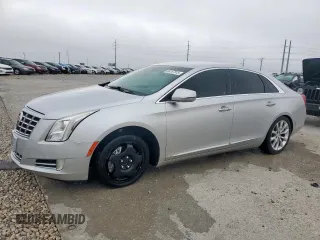 2013 Cadillac XTS Luxury with VIN 2G61P5S38D9199527, listed as a Copart auction lot 56157915 with 90,448 mi miles and Clean title. Bid and sale history available at DreamBid. Image 1.
