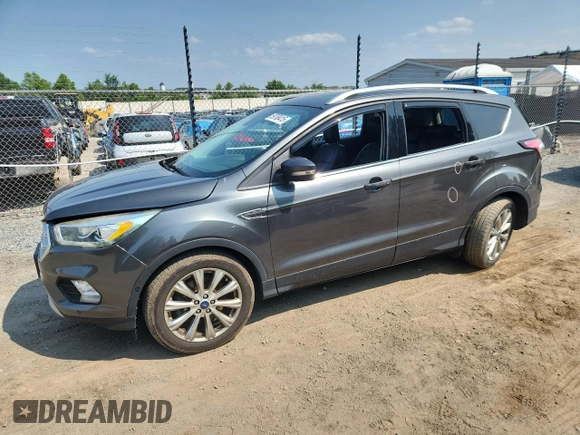 2018 Ford Escape Titanium with VIN 1FMCU9J90JUA15154, listed as a Copart auction lot 59768415 with 93,810 mi miles and Salvage title. Bid and sale history available at DreamBid. Image 1.