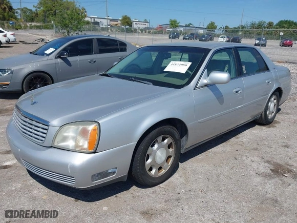 2001 Cadillac DeVille with VIN 1G6KD54Y91U235374, listed as a IAAI auction lot 41874980 with 136,090 mi miles. Bid and sale history available at carsss.com. Image 2.