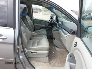 2007 Honda Odyssey EX-L with VIN 5FNRL38717B018097, listed as a IAAI auction lot 42028592 with 141,004 mi miles and . Bid and sale history available at DreamBid. Image 5.