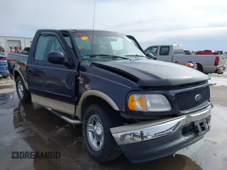 2000 Ford F-150 XL with VIN 1FTRX17L2YNB85627, listed as a IAAI auction lot 41377814 with 123,740 mi miles. Bid and sale history available at carsss.com. Image 12.