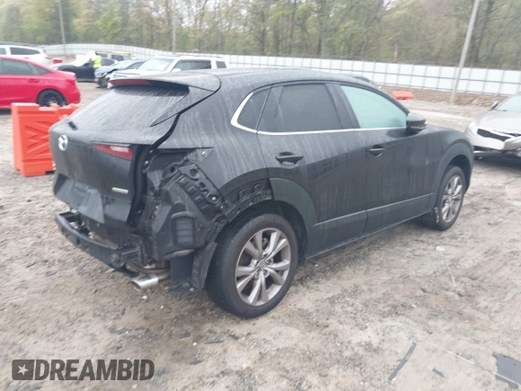 2020 Mazda CX-30 Select with VIN 3MVDMBCL3LM104988, listed as a IAAI auction lot 41951565 with 53,685 mi miles and . Bid and sale history available at DreamBid. Image 4.