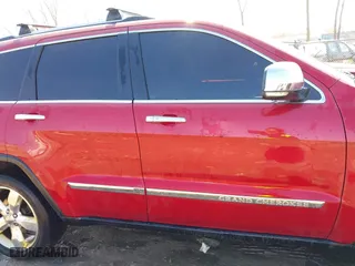 2011 Jeep Grand Cherokee Overland with VIN 1J4RR6GT7BC551649, listed as a IAAI auction lot 41897267 with 82,034 mi miles. Bid and sale history available at carsss.com. Image 13.