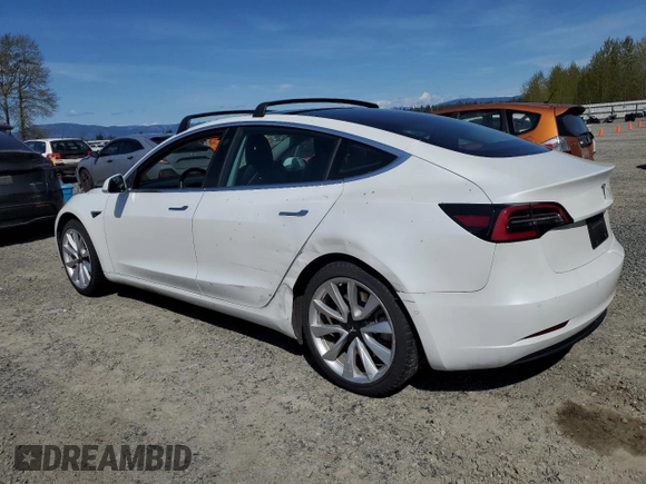 2019 Tesla Model 3 Mid Range with VIN 5YJ3E1EA0KF484178, listed as a Copart auction lot 53121915 with 64,929 mi miles and Salvage Title. Bid and sale history available at DreamBid. Image 2.