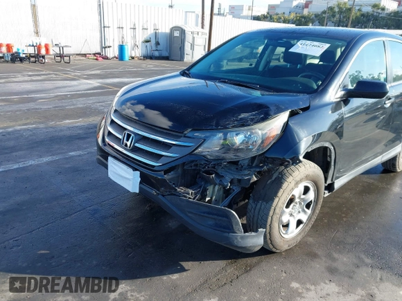 2014 Honda CR-V LX with VIN 3CZRM3H37EG717200, listed as a IAAI auction lot 41424082 with 58,888 mi miles. Bid and sale history available at carsss.com. Image 6.