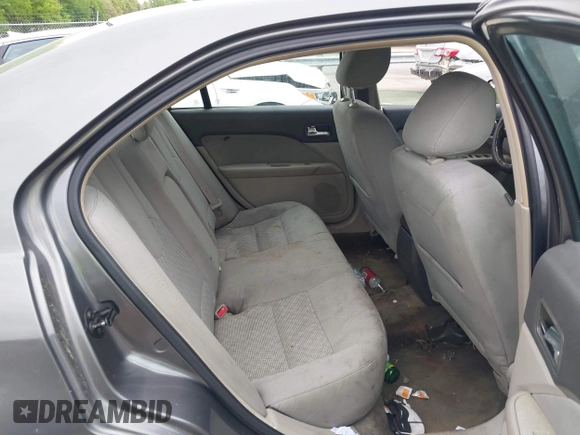 2011 Ford Fusion SE with VIN 3FAHP0HA1BR203046, listed as a IAAI auction lot 42011121 with 302,078 mi miles. Bid and sale history available at carsss.com. Image 8.