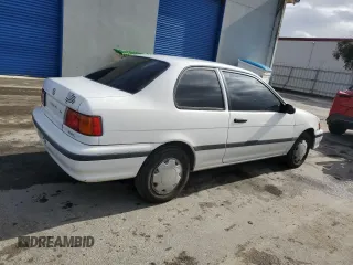 1992 Toyota Tercel z VIN JT2EL43B0N0152801, wystawiony jako Copart lot #43838825 z przebiegiem 81 697 mil mil oraz Tytuł czysty. Historia ofert i sprzedaży dostępna na DreamBid. Obrazek 3.