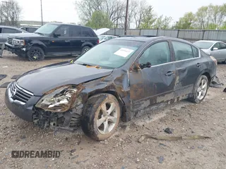 2009 Nissan Altima SE z VIN 1N4BL21E49C179974, wystawiony jako IAAI lot #42058454 z przebiegiem 196 351 mil mil oraz . Historia ofert i sprzedaży dostępna na DreamBid. Obrazek 17.