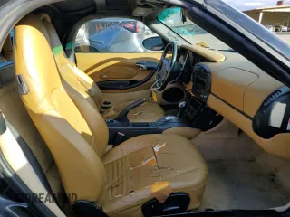 2000 Porsche Boxster z VIN WP0CA2980YU626358, wystawiony jako Copart lot #36977344 z przebiegiem 117 561 mil mil oraz Szkoda całkowita • Salvage title. Historia ofert i sprzedaży dostępna na DreamBid. Obrazek 10.