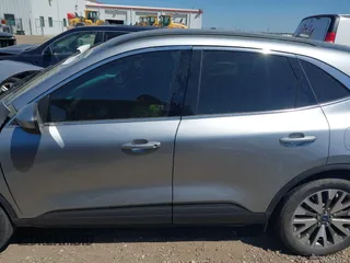 2021 Ford Escape Titanium Hybrid z VIN 1FMCU0DZ3MUB04065, wystawiony jako IAAI lot #41764797 z przebiegiem 28 881 mil mil oraz . Historia ofert i sprzedaży dostępna na DreamBid. Obrazek 15.