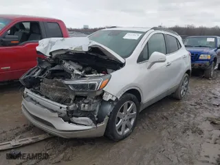 2019 Buick Encore Essence with VIN KL4CJCSM2KB734927, listed as a IAAI auction lot 41470478 with 137,459 mi miles. Bid and sale history available at carsss.com. Image 2.