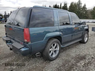1999 GMC Denali z VIN 1GKEK13R6XR918944, wystawiony jako Copart lot #46049675 z przebiegiem 140 826 mil mil oraz Tytuł czysty. Historia ofert i sprzedaży dostępna na DreamBid. Obrazek 3.