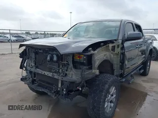 2017 Toyota Tacoma SR5 with VIN 5TFAZ5CN4HX047095, listed as a IAAI auction lot 41951364 with 127,706 mi miles and . Bid and sale history available at DreamBid. Image 6.