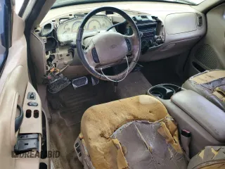 1999 Ford F-150 XL with VIN 1FTRF17L8XNA75702, listed as a Copart auction lot 69868104 with Not provided miles and Salvage title. Bid and sale history available at DreamBid. Image 8.