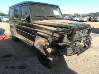 2005 Mercedes-Benz G-Class with VIN WDCYR49E25X156547, listed as a IAAI auction lot 38640157 with 241,209 mi miles. Bid and sale history available at carsss.com. Image 1.