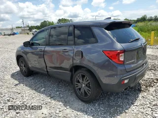 2021 Honda Passport EX-L with VIN 5FNYF8H54MB002017, listed as a Copart auction lot 59850975 with 54,275 mi miles and Salvage title. Bid and sale history available at DreamBid. Image 2.