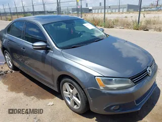 2012 Volkswagen Jetta TDI w/Premium z VIN 3VWLL7AJ1CM307485, wystawiony jako IAAI lot #42384300 z przebiegiem 118 958 mil mil oraz . Historia ofert i sprzedaży dostępna na DreamBid. Obrazek 1.