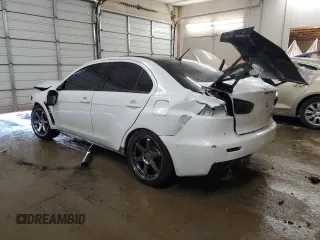 2015 Mitsubishi Lancer Evolution Final Edition z VIN JA32W7FV4FU028743, wystawiony jako Copart lot #75206334 z przebiegiem 51 409 mil mil oraz Szkody całkowita. Historia ofert i sprzedaży dostępna na DreamBid. Obrazek 2.