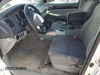 2007 Toyota Tacoma PreRunner with VIN 3TMJU62N57M047584, listed as a Copart auction lot 55884725 with 296,545 mi miles and Salvage title. Bid and sale history available at DreamBid. Image 7.