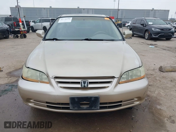 2001 Honda Accord EX z VIN 1HGCG165X1A077702, wystawiony jako IAAI lot #41770556 z przebiegiem 149 516 mil mil oraz . Historia ofert i sprzedaży dostępna na DreamBid. Obrazek 12.