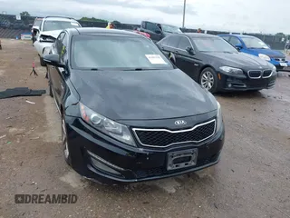 2013 Kia Optima SX with VIN 5XXGR4A64DG207512, listed as a IAAI auction lot 42483528 with 127,748 mi miles and . Bid and sale history available at DreamBid. Image 1.