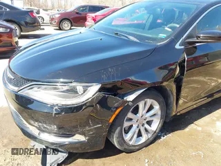 2015 Chrysler 200 Limited with VIN 1C3CCCABXFN662545, listed as a IAAI auction lot 41798590 with 76,766 mi miles. Bid and sale history available at carsss.com. Image 6.