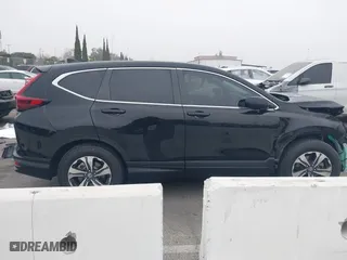 2020 Honda CR-V LX with VIN 7FARW1H24LE011269, listed as a IAAI auction lot 41216714 with 34,777 mi miles. Bid and sale history available at carsss.com. Image 14.