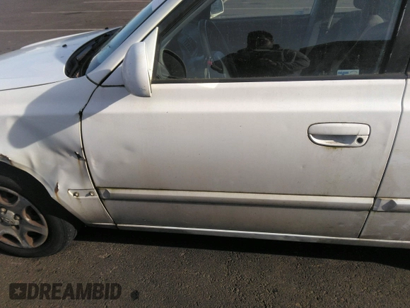 2004 Hyundai Accent GL with VIN KMHCG45C04U498939, listed as a IAAI auction lot 41384821 with 247,994 mi miles. Bid and sale history available at carsss.com. Image 12.