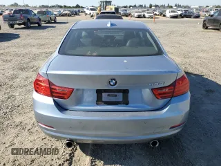 2014 BMW 4 Series 435i with VIN WBA3R1C55EK191486, listed as a Copart auction lot 64141605 with 59,568 mi miles and Salvage title. Bid and sale history available at DreamBid. Image 6.