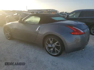 2014 Nissan 370Z Touring with VIN JN1AZ4FH4EM620092, listed as a Copart auction lot 77439254 with 38,662 mi miles and Salvage Title. Bid and sale history available at DreamBid. Image 2.