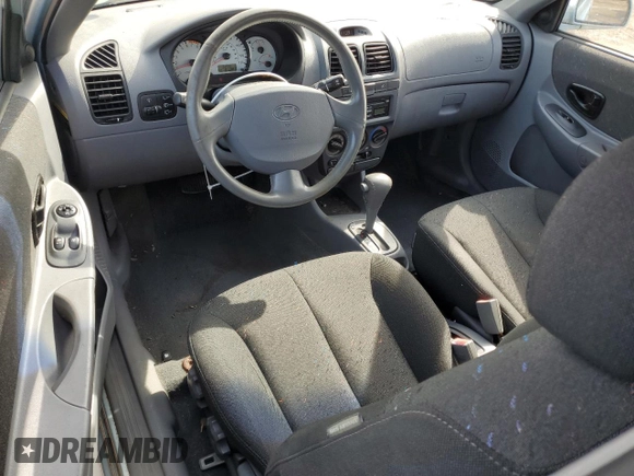 2005 Hyundai Accent GLS with VIN KMHCG35CX5U335873, listed as a Copart auction lot 74374674 with 91,381 mi miles and Clean Title. Bid and sale history available at carsss.com. Image 8.