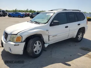 2002 GMC Envoy SLT z VIN 1GKDS13S522229896, wystawiony jako Copart lot #55463175 z przebiegiem Nie podano mil oraz Szkoda całkowita • Salvage title. Historia ofert i sprzedaży dostępna na DreamBid. Obrazek 1.