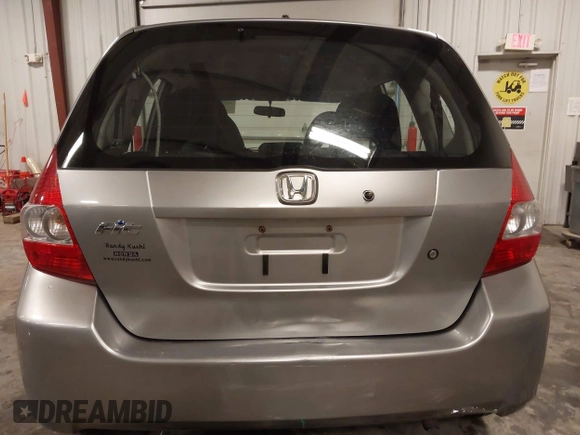 2007 Honda Fit with VIN JHMGD38417S045716, listed as a IAAI auction lot 42340897 with 63,765 mi miles and . Bid and sale history available at DreamBid. Image 6.