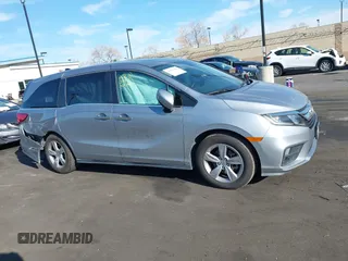2018 Honda Odyssey EX-L with VIN 5FNRL6H71JB089289, listed as a IAAI auction lot 41813322 with 94,933 mi miles and . Bid and sale history available at DreamBid. Image 14.