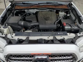 2017 Toyota Tacoma SR5 z VIN 5TFCZ5AN1HX113842, wystawiony jako Copart lot #60711285 z przebiegiem 124 799 mil mil oraz Szkoda całkowita • Salvage title. Historia ofert i sprzedaży dostępna na DreamBid. Obrazek 11.